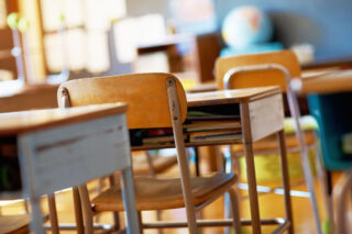 photo - Classroom with Empty Wooden Desks