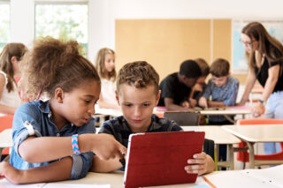 photo - Elementary Students at Desks in Classroom