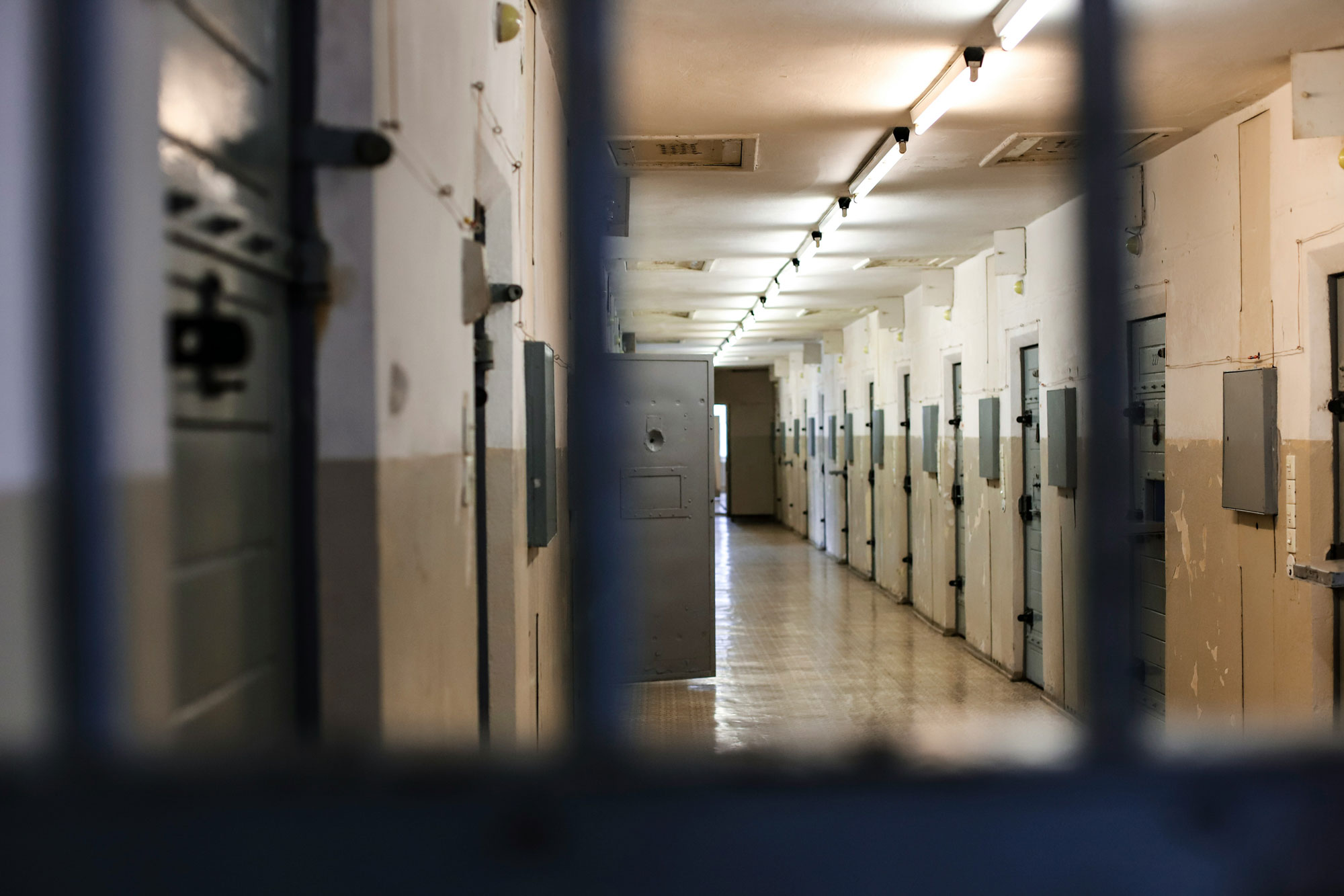 Photo - Long Hallway with Prison Cell Doors