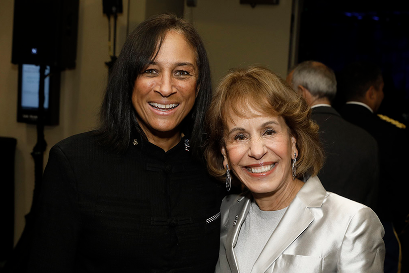 Two women standing for a photo