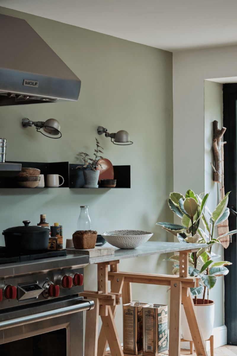 French gray by Farrow & Ball in kitchen with metal hood and sconces