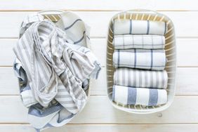 How to Sanitize Laundry: two laundry baskets with towels