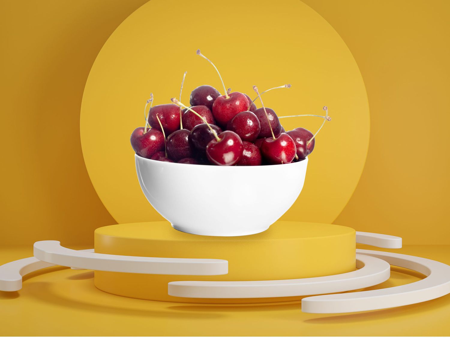 Foods That Help You Sleep: bowl of cherries on a pedestal