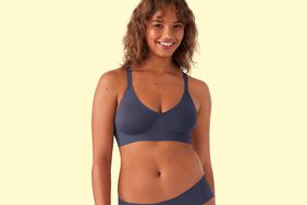 A person wearing a comfortable bra we recommend against a yellow background