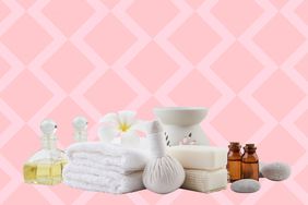 Various spa items displayed against a pink background