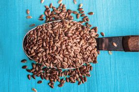 Health benefits of flaxseeds: spoon full of flax seeds