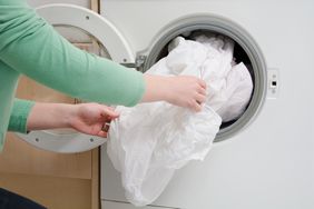 keep-sheets-from-balling-up-in-a-dryer-GettyImages-84491929