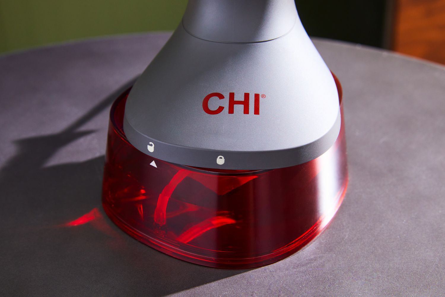 The CHI Handheld Garment Steamer's water tank at the bottom.