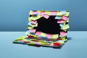 How Anxiety Impacts Work Performance and How to Beat It: laptop with lots of post-its