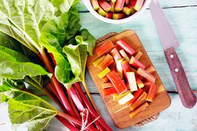 pieces of rhubarb on turquoise wooden surface