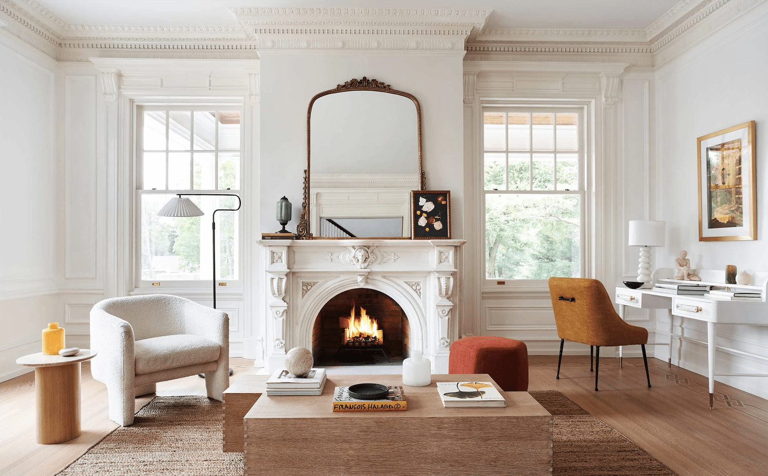 Interior of white and neutral living room with crown molding