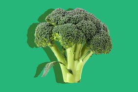 Broccoli floret on a green background