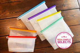 Homelux Theory Reusable Silicone Food Storage Bags displayed on a wooden surface