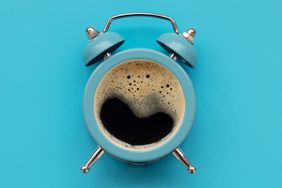 blue coffee mug that looks like an old-fashioned alarm clock