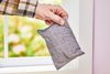 person holding a Vergali Bamboo Charcoal Odor Absorber Bag