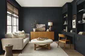 home office and living room with black walls