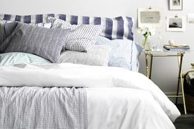 Bed with blue and white linens