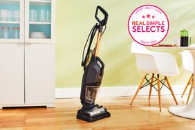 Th Bissell B0440 Crosswave Hydrosteam Plus Multi Surface Wet Dry Vac Bundle on a wooden floor