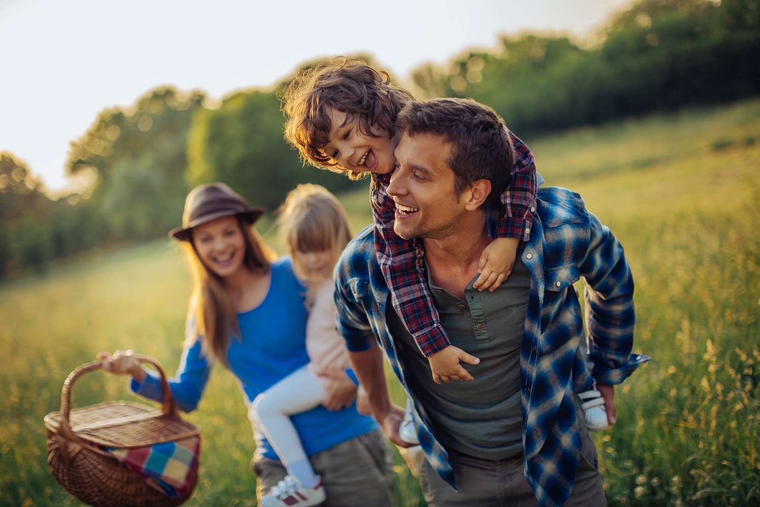 Photo of a happy family going for picnic