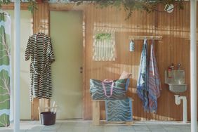 Colorful bathrobes and towels in a sauna environment