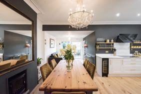 kitchen and dining area with charcoal grey walls