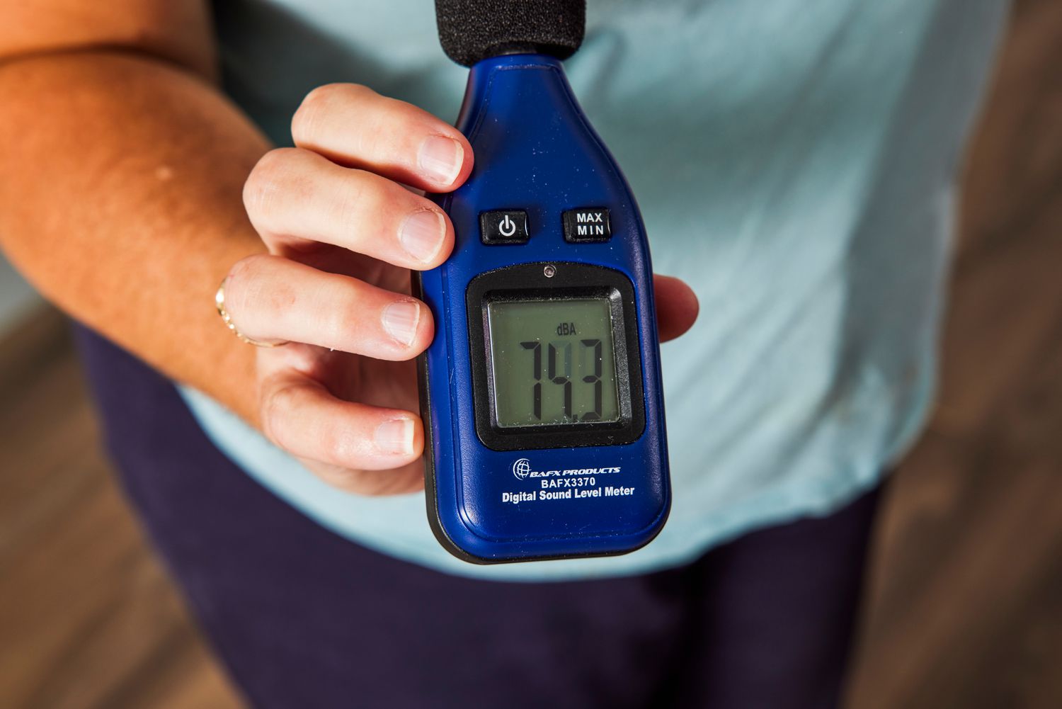 Close-up of a sound meter reading the noise created by the Miele Classic C1 Pure Suction PowerLine Vacuum.