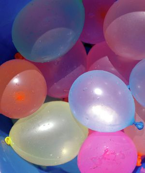 Water balloons in a bucket