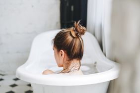 benefits-of-hot-baths-realsimple-GettyImages-1395495521