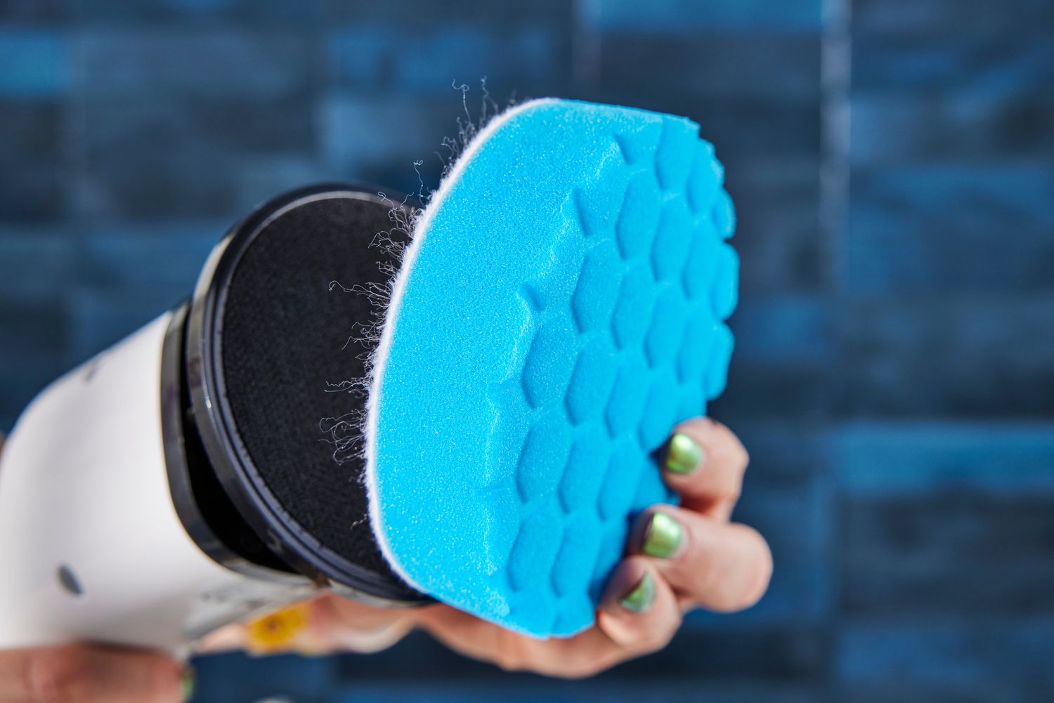 Close-up of a soft scrubbing pad on a Losuy Electric Spin Scrubber