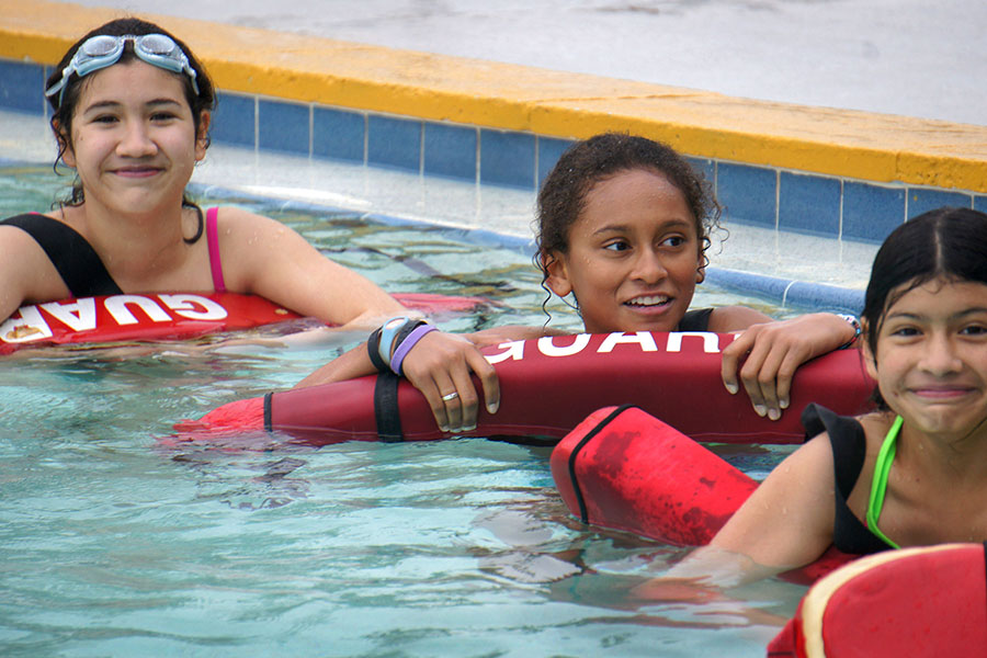 Children learning to swim