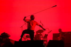 GLASTONBURY, ENGLAND - JUNE 28: Joe Talbot of Idles performs during their headline set on the Other Stage during day three of Glastonbury Festival 2024 at Worthy Farm, Pilton on June 28, 2024 in Glastonbury, England. The new installation is built from an ex-military helicopter and features projections on the body, programmed lights on the eyes and laser wings. Founded by Michael Eavis in 1970, Glastonbury Festival features around 3,000 performances across over 80 stages. Renowned for its vibrant atmosphere and iconic Pyramid Stage, the festival offers a diverse lineup of music and arts, embodying a spirit of community, creativity, and environmental consciousness. (Photo by Leon Neal/Getty Images)