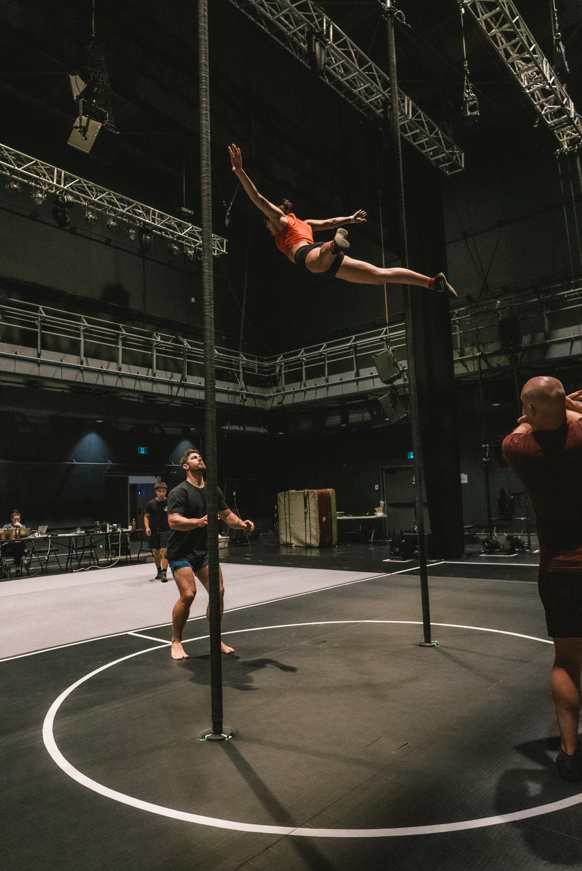 Acrobats rehearse scenes from The 7 Fingers company's new show, "Duel Reality," which plays July 6 through Aug. 4 at The Old Globe in San Diego. (Francisco Cruz)