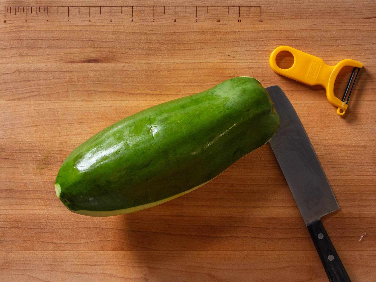 Green papaya on a cutting board