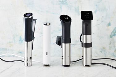 Best sous vide machines (immersion circulators) in front of colorful backdrop