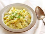 Serving bowl of Austrian potato salad (Erdapfelsalat).