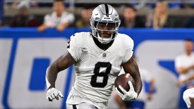 Las Vegas Raiders running back Josh Jacobs (8) runs wide for a first down during the Detroit Lions versus the Las Vegas Raiders game on Monday October 30, 2023 at Ford Field in Detroit, MI.