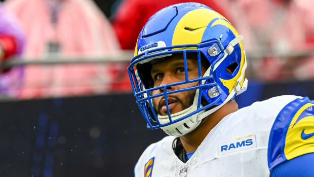 Aaron Donald looks up wearing a helmet