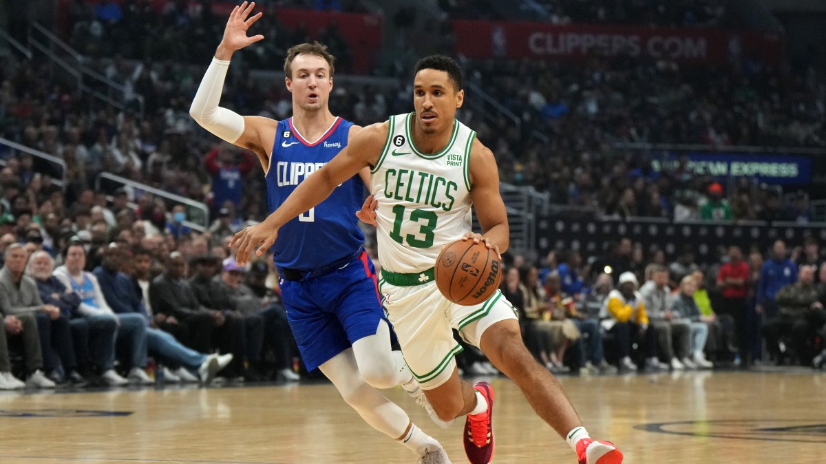 Boston Celtics guard Malcolm Brogdon (13) dribbles the ball against LA Clippers in the first half at Crypto.com Arena.