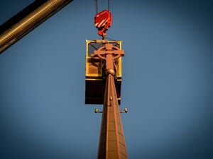 Syracuse church replaces its steeples — 99 years after they fell down