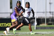 Defcon1 running back Robert Ortega Jr. (000) against Fleaux safety Demetres Samuel Jr. (2), left, during the OT7 Championships football tournament on Sunday, June 9, 2024 in Tampa, Fla. (Phelan M. Ebenhack/AP Content Services for the NFL)