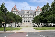 The New York state Capitol is pictured, June 30, 2022, in Albany, New York. New York lawmakers began voting Monday, May 1, 2023, on a $229 billion state budget due a month ago that would raise the minimum wage, alter the bail law and ban gas stoves and furnaces in new buildings.