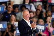 Democratic vice presidential candidate Minnesota Gov. Tim Walz speaks at a campaign rally Wednesday, Aug. 7, 2024, in Romulus, Mich., with Democratic presidential nominee Vice President Kamala Harris. (AP Photo/Carlos Osorio)