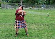 Scottish Games Master world champion, Courtney McGuire, of Ithaca, demonstrates the hammer throw. McGuire will be competing in the 81st annual CNY Scottish Games at Longbranch Park in Liverpool on Saturday.