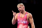 Kyle Dake of Team United States reacts during the Men’s FreeStyle 74kg 1/8 Final match between Kyle Douglas Dake of Team United States and Anthony Jose Montero Chirinos of Team Venezuela on day fourteen of the Olympic Games Paris 2024 at Champs-de-Mars Arena on August 09, 2024 in Paris, France. (Photo by Julian Finney/Getty Images)