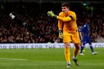 Tottenham identified and banned a supporter who threw a cup at Chelsea goalkeeper Kepa Arrizabalaga