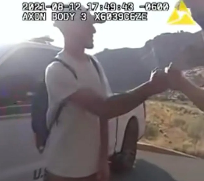 At one point in the video, an officer reaches out to give Brian a fist-bump during their cordial conversation