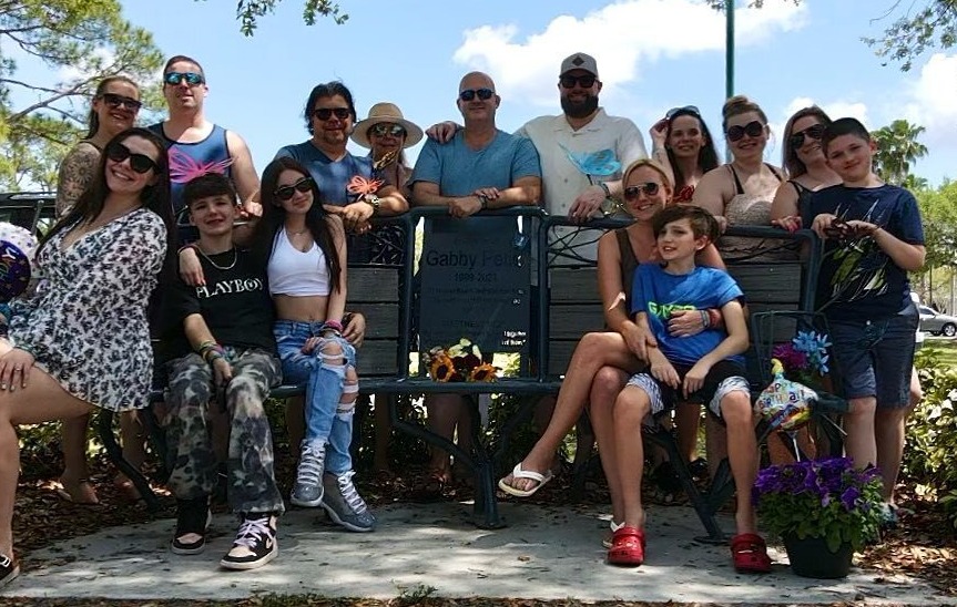 The Petito family sat on a bench built to commemorate Gabby