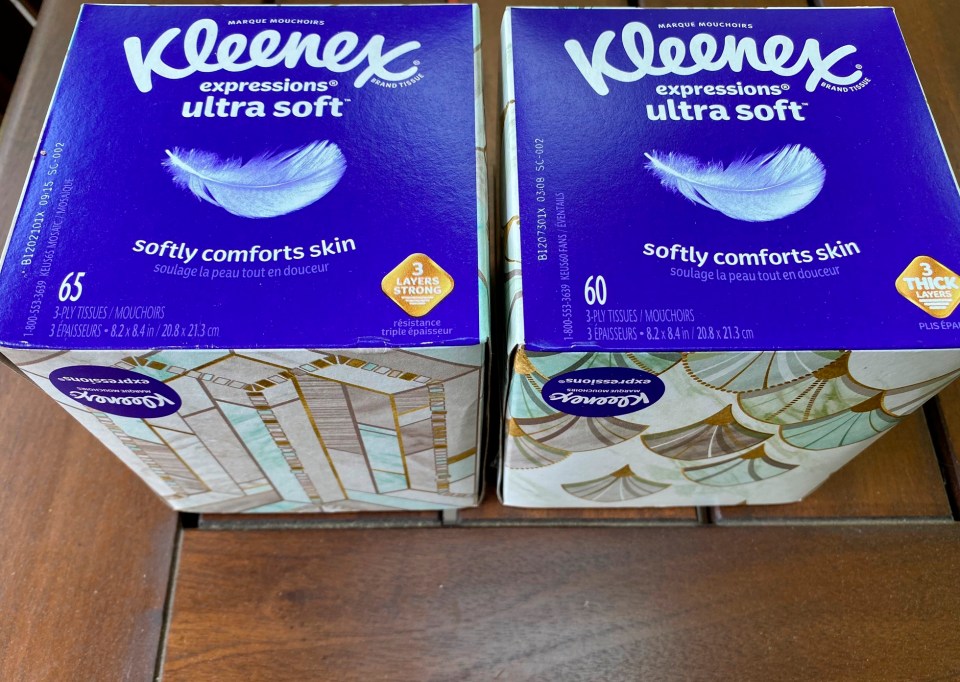 Two boxes of Kleenex tissues show shrinkflation with fewer tissue in the box on the right