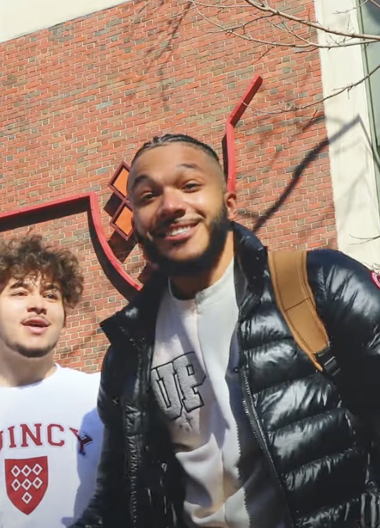 In the video, Gabe raps about his new school dorm, Quincy House