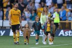 WOLVERHAMPTON, ENGLAND - MAY 20: Ruben Neves of Wolverhampton Wanderers and his wire Debora Lourenco and children walk around the pitch on the last home game of the season during the Premier League match between Wolverhampton Wanderers and Everton FC at Molineux on May 20, 2023 in Wolverhampton, United Kingdom. (Photo by Matthew Ashton - AMA/Getty Images)